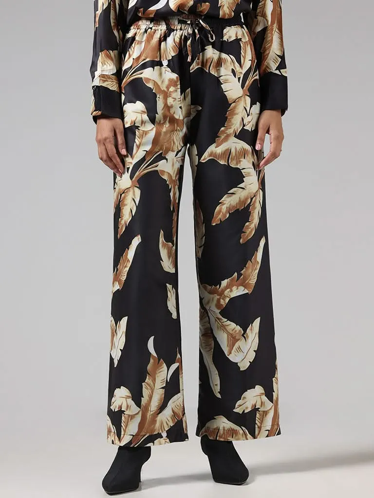 Wardrobe Black Leaf Printed Trousers